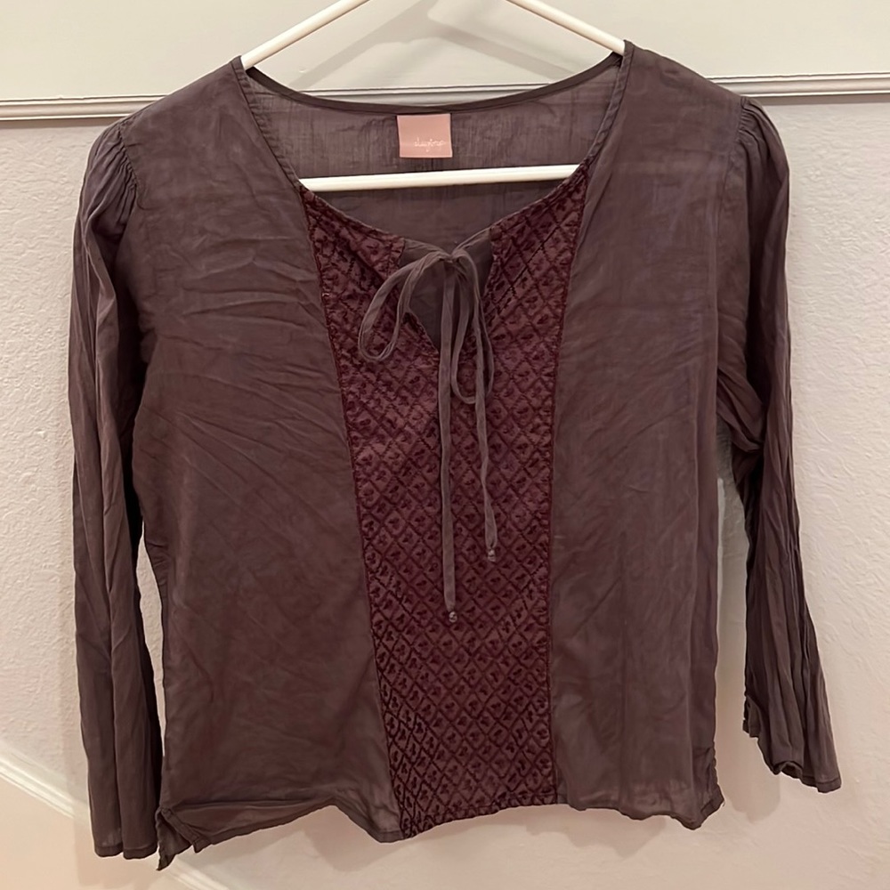 Super cute and sweet tie in the front shirt!